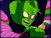 Image: Still holding Nappa's tail, Piccolo recoils from Nappa's strike