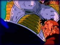 Image: Goku watches as Vegeta transforms